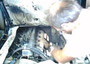 Richard checks the thermostat on the truck.