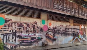 Mural on wooden building.