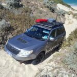 David takes his Forester up the exit track.